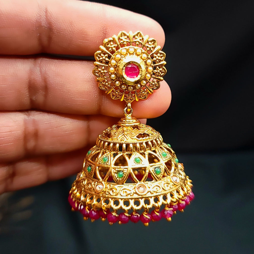 Gold big jhumka deals earrings