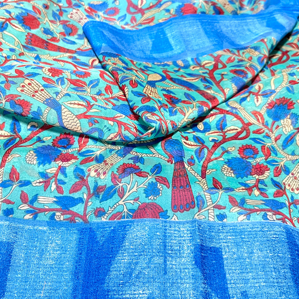 Turquoise Blue Kalamkari Georgette Saree with stitched Blouse