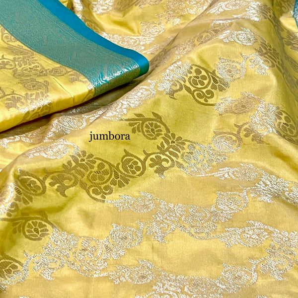 Pastel Yellow & Sea Green Jangla Banarasi Silk Saree with stitched Blouse